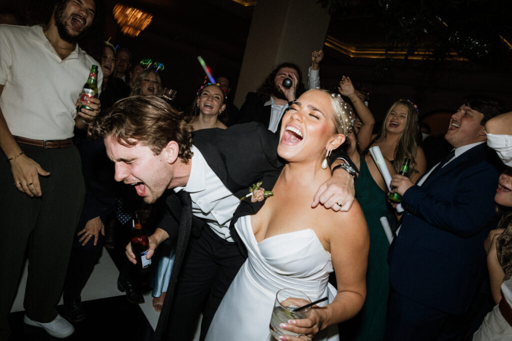 bride and groom partying at their wedding